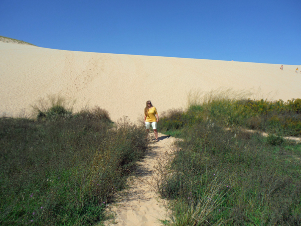 Karen Duquette ready to climb the sand dune
